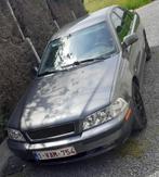 Volvo s40 benziene met maar 142.000km, Voorwielaandrijving, 4 deurs, Zwart, 4 cilinders