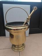 wijwatervat met borstel, Ophalen