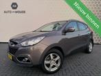 Hyundai ix35 2.0i i-Catcher Automaat Stoelverwarming, Auto's, Gebruikt, 4 cilinders, Bruin, Leder en Stof