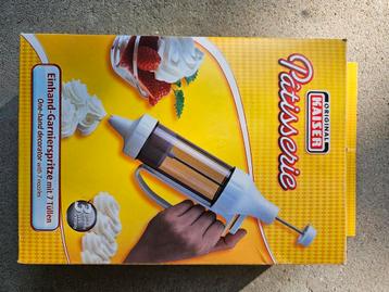 Garnierspuit met 7 verschillende spuitstukken beschikbaar voor biedingen