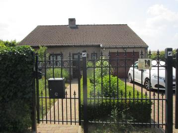 Lochristi: uitstekend onderhouden woning met garage en tuin beschikbaar voor biedingen