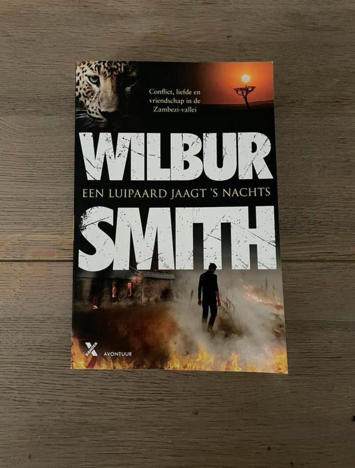 Wilbur Smith - Een luipaard jaagt ’s nachts, Boeken, Thrillers, Zo goed als nieuw, Amerika, Ophalen of Verzenden