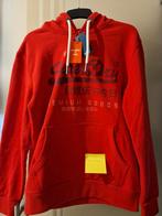 Sweater merk Superdry, Enlèvement