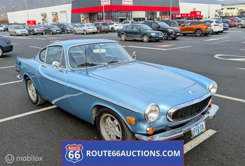Volvo P1800 Coupé 1972 | Route 66 Auctions, Auto's, Oldtimers, Bedrijf, Te koop, Volvo, Benzine, Coupé, 2 deurs, Handgeschakeld