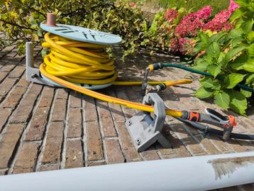 MUURHASPEL GARDENA MET TUINSLANG 25 m  diameter 19 mm beschikbaar voor biedingen