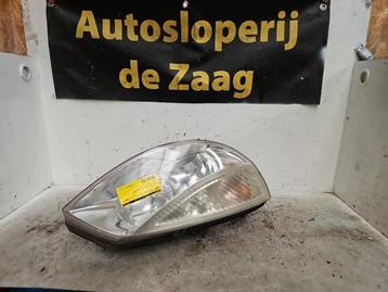 Koplamp rechts van een Renault Grand Scenic beschikbaar voor biedingen