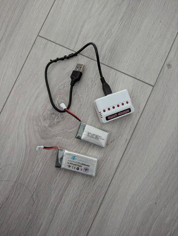 Oplader + 2 3,7V-batterij beschikbaar voor biedingen