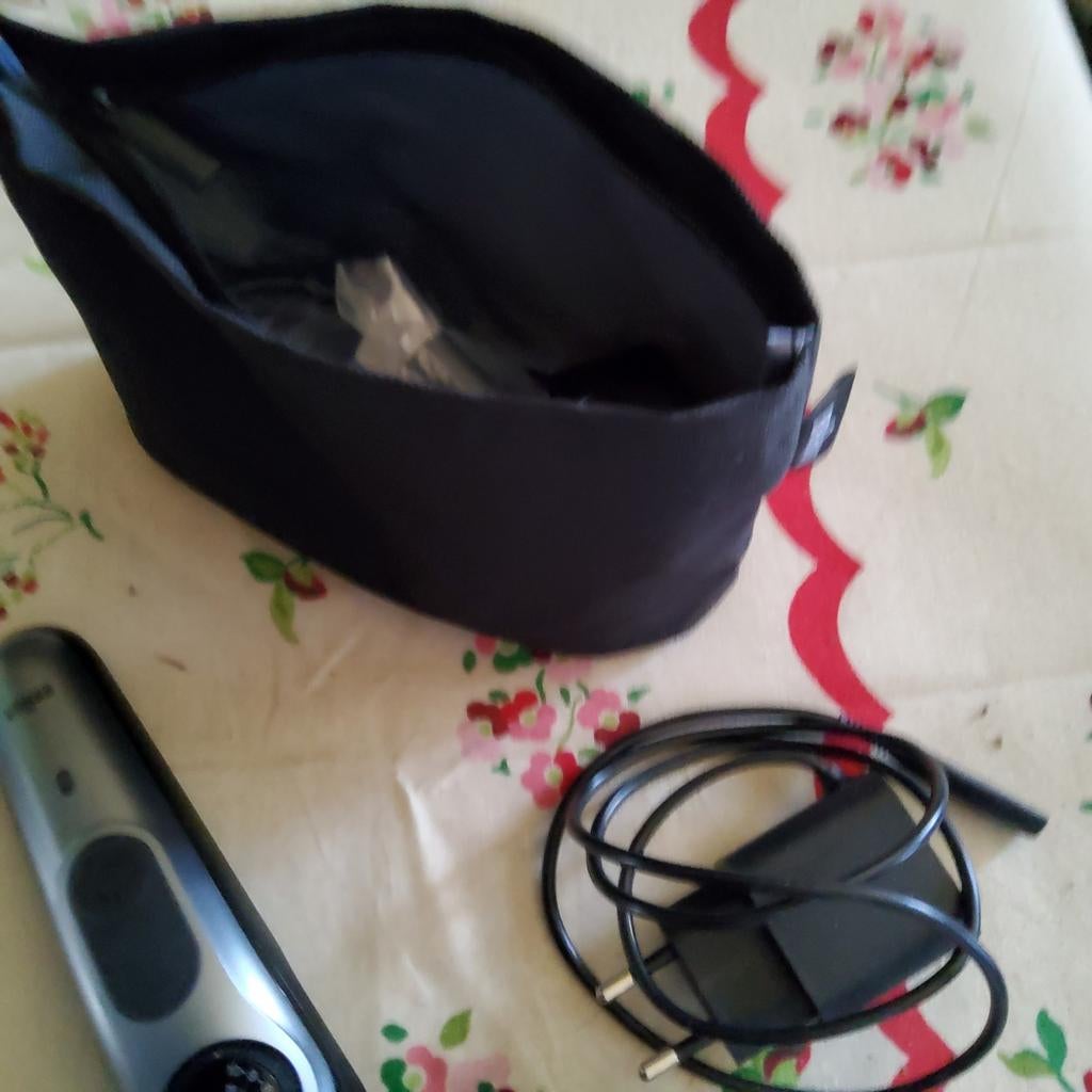 Braun trimmer met hulpstukken, Ophalen