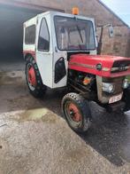 Goed werkende tractor Massey Ferguson 135, Ophalen