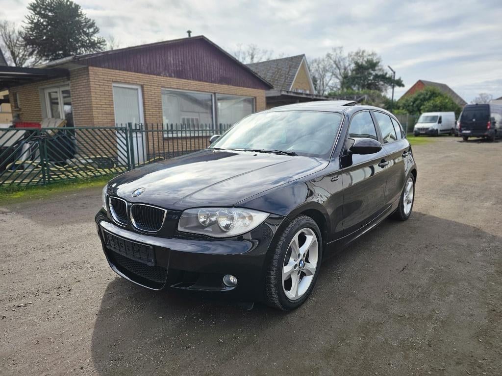 BMW 116i Gekeurd en Garantie!!!, Auto's, 1596 cc, Zwart, Zwart, 5 deurs