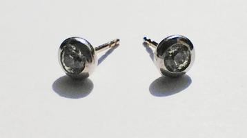 DIAMANTEN OORBELLEN 0.25CT STUK 18KT WITGOUD beschikbaar voor biedingen