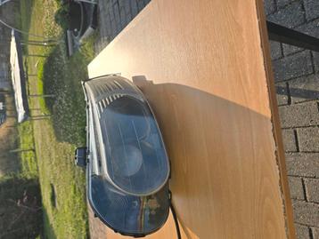 SAAB 9-5 Xenon linkse en rechtse koplamp beschikbaar voor biedingen