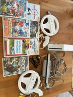 Nintendo Wii wit met 2 controllers, stuurwielen en games, Ophalen of Verzenden, Zo goed als nieuw, Met 2 controllers