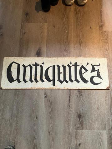 Antiek bord reclame beschikbaar voor biedingen