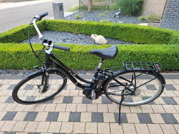 Elektrische fiets met middenmotor en goede batterij beschikbaar voor biedingen