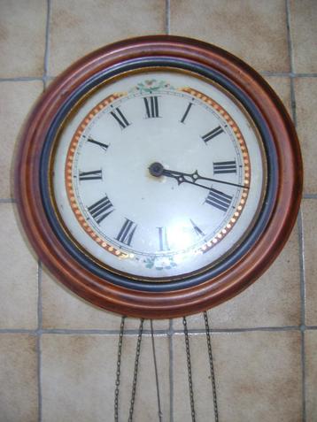 mooie antieke ronde klok te koop