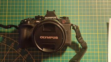 Olympus E-M1 met Zuiko 14-150mm en Zuiko 9-18mm beschikbaar voor biedingen