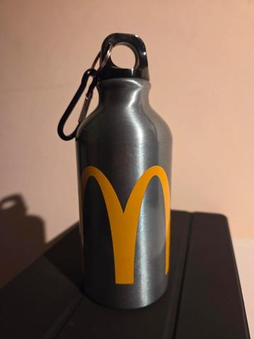 Grijze metalen fles van Mc Donald  beschikbaar voor biedingen