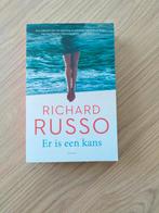 Boek te koop: Richard Russo - Er is een kans, Wereld overig, Richard Russo, Ophalen of Verzenden, Zo goed als nieuw
