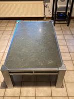 Grijze salontafel, Ophalen