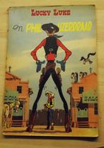 Lucky Luke en Phil IJzerdraad  1e druk 1957, Boeken, Gelezen, Morris, Ophalen of Verzenden, Eén stripboek