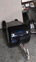 Aanhanger achter motorfiets, Ophalen