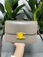 Beige lederen Triomphe handtas, Handtassen en Accessoires, Tassen | Damestassen, Ophalen of Verzenden, Nieuw, Beige, Handtas