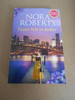 Nora Roberts - Tussen licht en donker, Ophalen of Verzenden, Nieuw, Nora Roberts