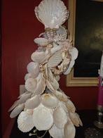 Beeld gemaakt met schelpen, Enlèvement