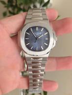 Patek Phillipe Nautilus 5711/1A-010, Bijoux, Sacs & Beauté, Rolex, Acier, Enlèvement, Acier