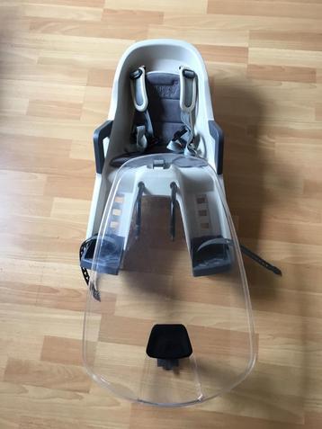 Fietsstoeltje voor vooraan met windscherm. beschikbaar voor biedingen