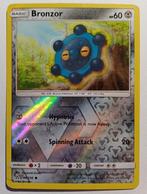 Pokémonkaart Bronzor Ultra Prism 86/156 Rev. Holo, Hobby en Vrije tijd, Verzamelkaartspellen | Pokémon, Foil, Gebruikt, Ophalen of Verzenden