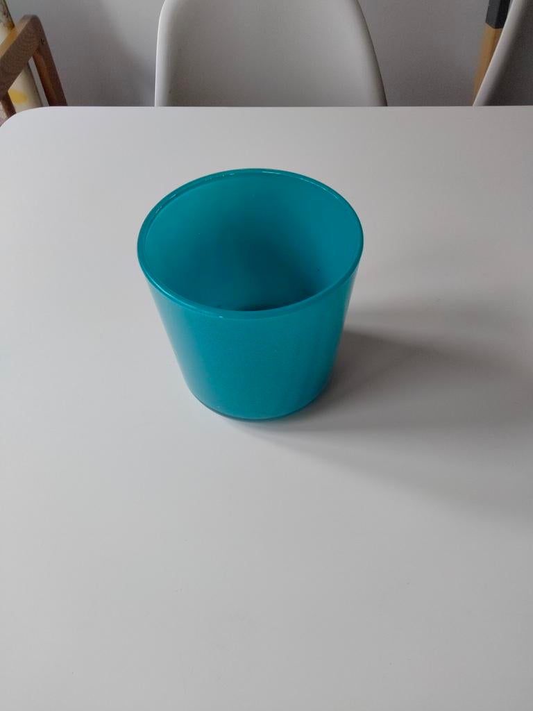 Mooie turkooizen bloempot, Ophalen