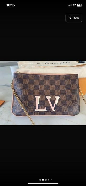 Louis Vuitton Pochette damier met dubbel rits beschikbaar voor biedingen