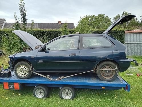 Crossauto mazda 323, Auto's, Mazda, Particulier, Benzine, Euro 2, Stadsauto, 3 deurs, Handgeschakeld, Blauw, Voorwielaandrijving