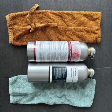 2 warmwater kruiken met zakken beschikbaar voor biedingen