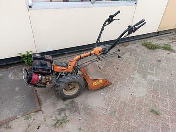 Benzine tuinfrees 40cm gebruikt beschikbaar voor biedingen