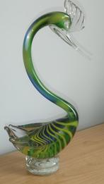 Cygne en verre vert et bleu, Ophalen