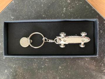 sleutelhangers Ferrari- zeilschip- volleybal- plop - pokémon beschikbaar voor biedingen