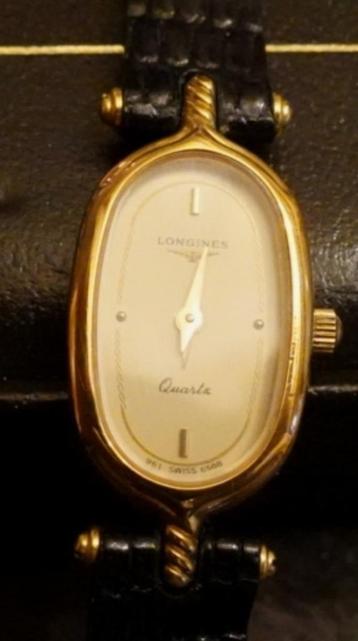 Longines. Montre dame avec écrin et papiers 