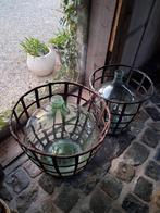 Dame jeannes met iizeren korf, Ophalen