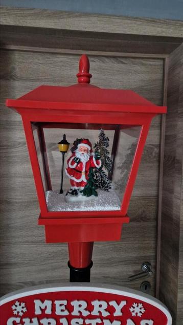 Lampadaire de Noël animé beschikbaar voor biedingen