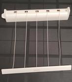 Uitrolbare waslijn, Ophalen, Zo goed als nieuw