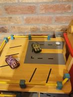 Houten speelgoedgarage, Ophalen