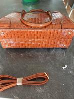 Handtas, Ophalen, Handtas