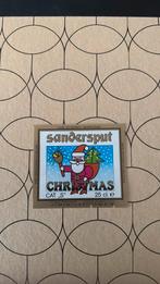 Etiket sandersput christmas, Enlèvement