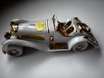Swarovski beeldje met limoges auto afgewerkt met goud in hee, Verzamelen, Swarovski, Ophalen of Verzenden, Zo goed als nieuw, Figuurtje