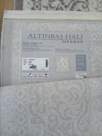 Tapis, Comme neuf