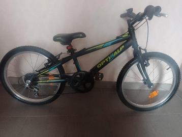 Te koop Optimalp bike mountainbike jongen 20 inch casi nieuw beschikbaar voor biedingen