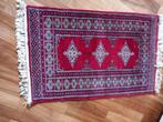 Tapis pakistanais, Ophalen